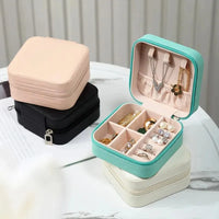 Portable Mini Jewelry Storage Box – Travel Leather Organizer for Earrings, Rings & Necklaces (4 Colors)